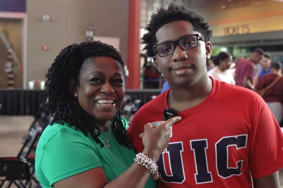 Demarion Brown (right) poses with his mother at the 2023 Take Flight event