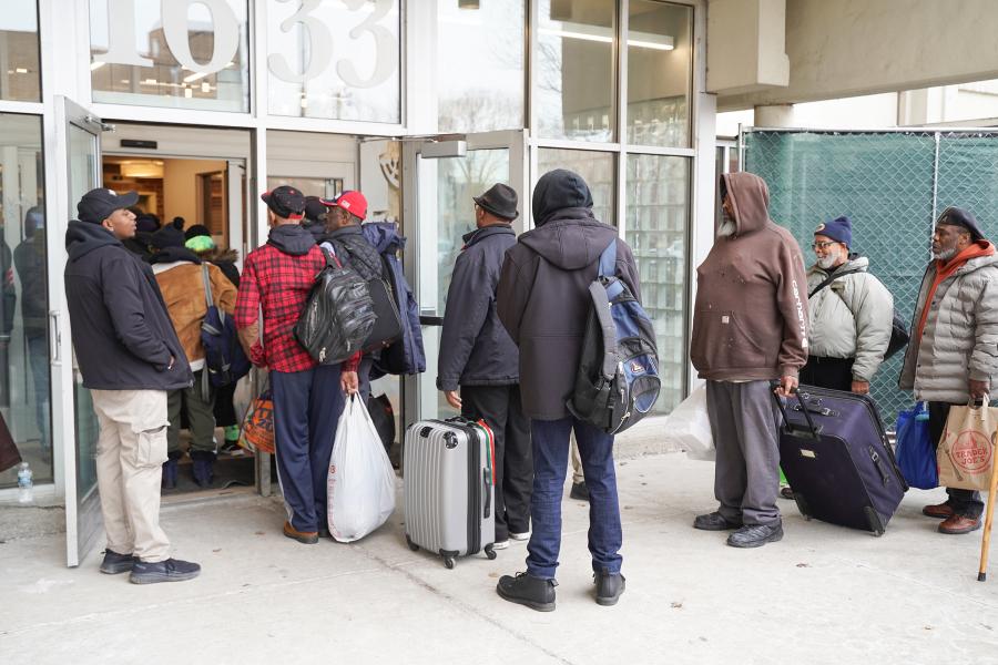 CHA clients lined up outside the Patrick Sullivan Apartments